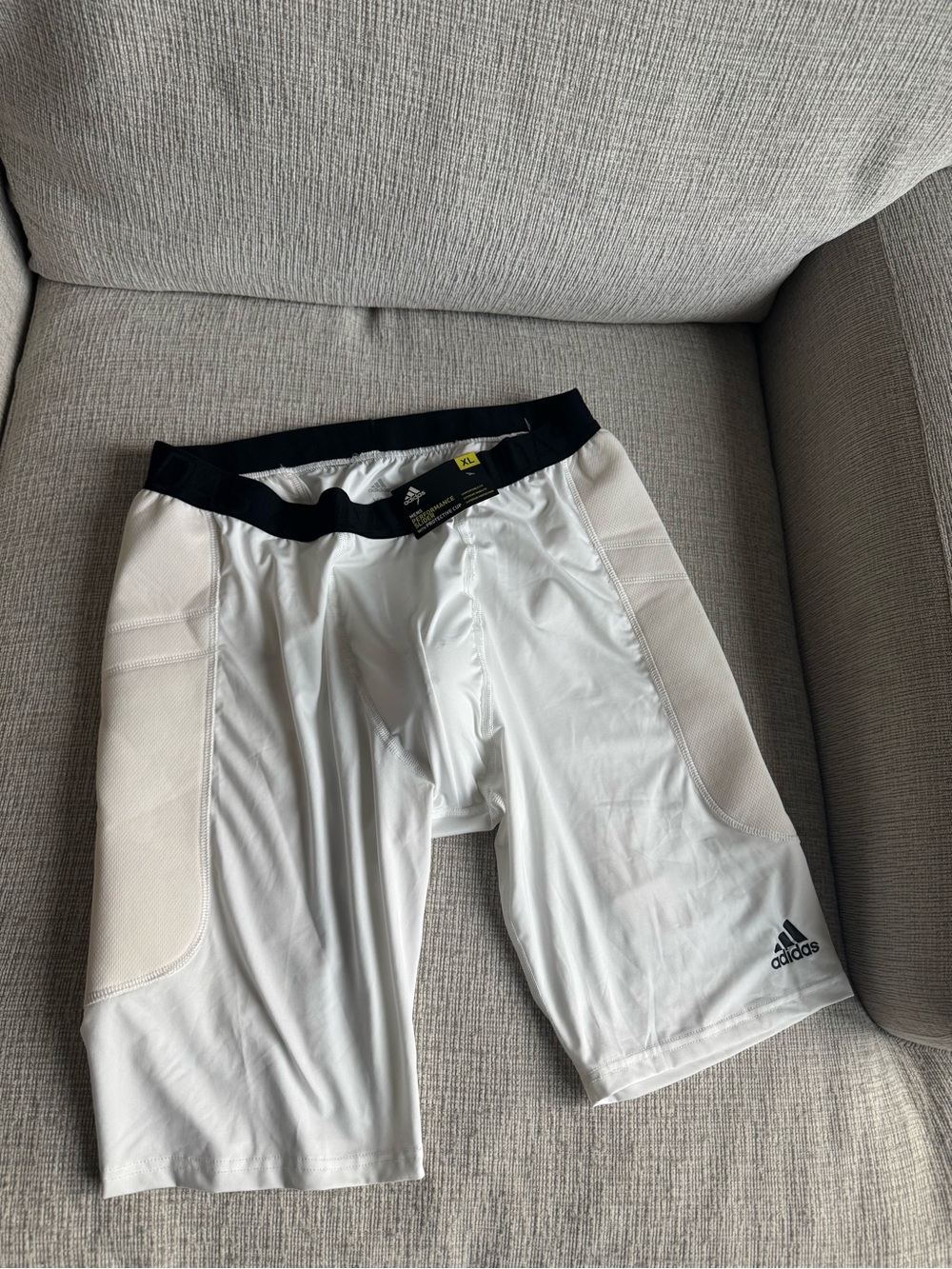 adidas Men’s performance slider with protective cup